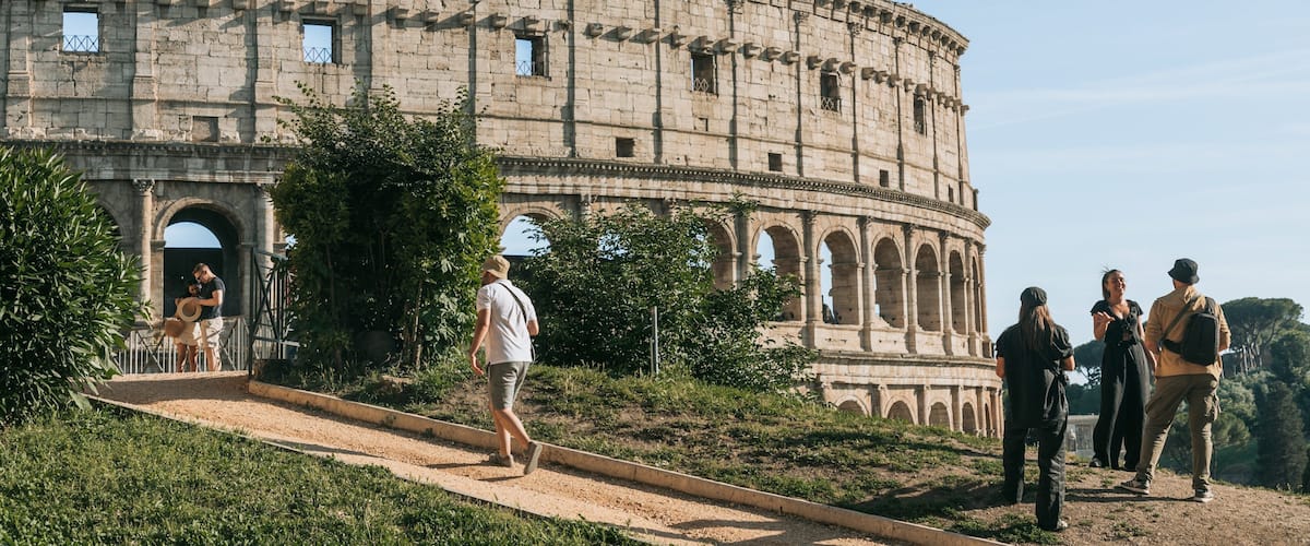 Monti featuring a ruin and heritage architecture as well as a small group of people