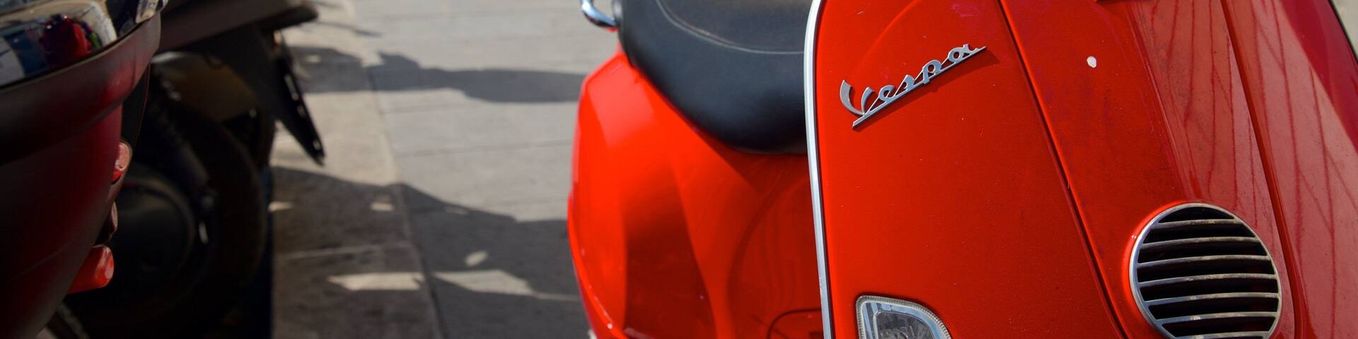 Via Marsala showing signage and a city as well as a small group of people