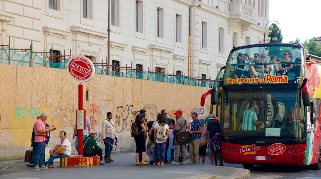 Via Marsala featuring vehicle touring as well as a small group of people