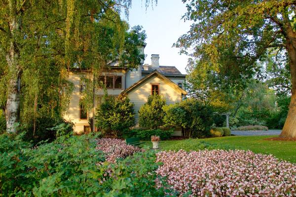 Bush House Museum featuring a park and a house