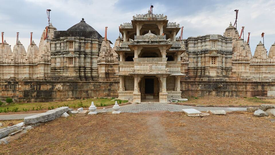 A large, ornate temple with multiple spires and intricate carvings.