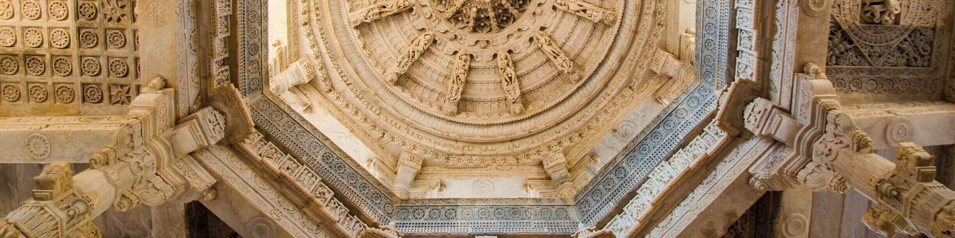 Beautifully carved highest dome supported by eight pillars of massive light-coloured-marble Jain Temple at Ranakpur in Rajasthan (India) was not built by a King or Ruler, instead it is product of a divine vision of a local business person. Temple dates back to 15th century. 1444 marble pillars, carved in exquisite detail, support the temple. The pillars are all differently carved and no two pillars are the same. Also all the statues face one or the other statue. A truly man made miracle somewhere lost on the map of India.
#LifeAtExpedia