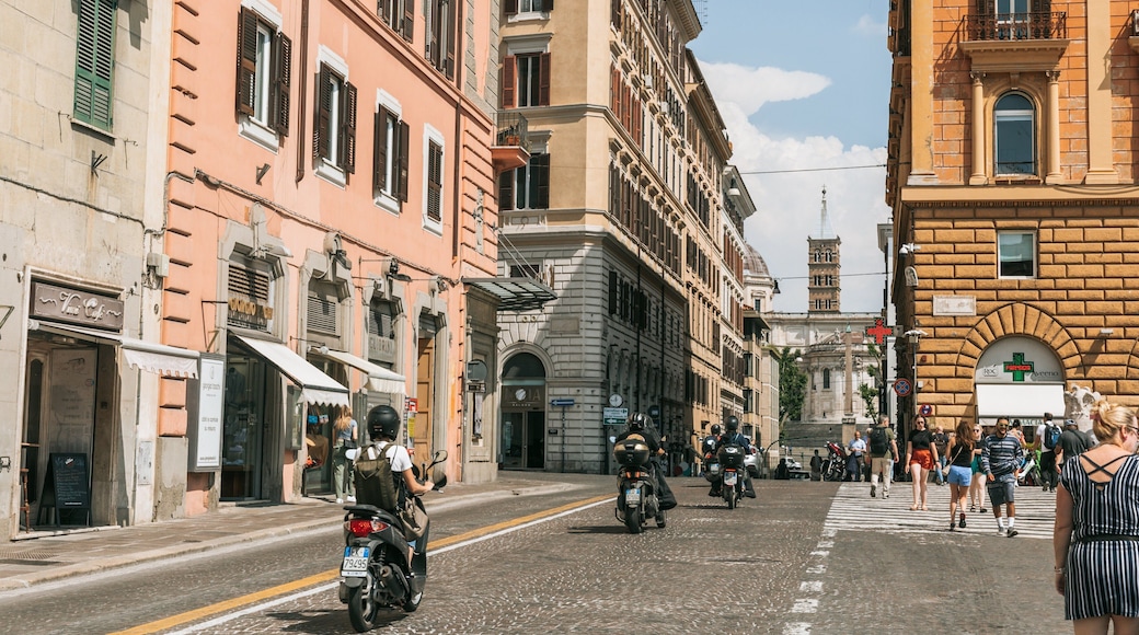Repubblica featuring a city, motorcycle riding and street scenes
