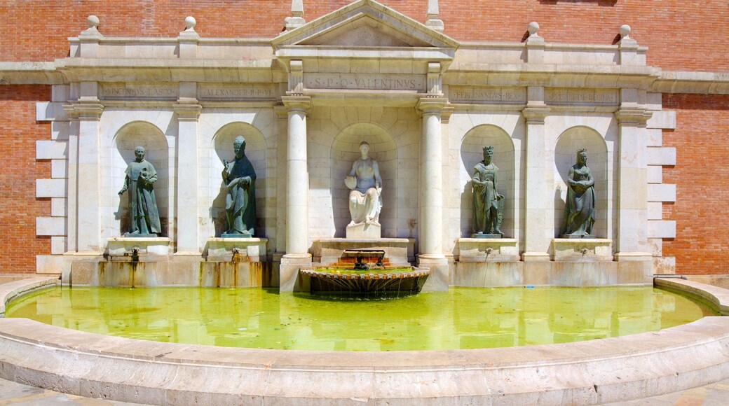 Valencia Bymidte og byder på en statue eller en skulptur, kunst og udendørs kunst