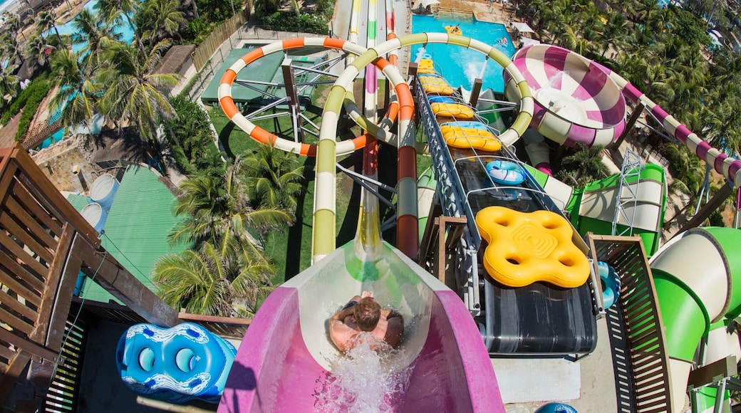 Beach Park Water Park featuring a waterpark as well as an individual male