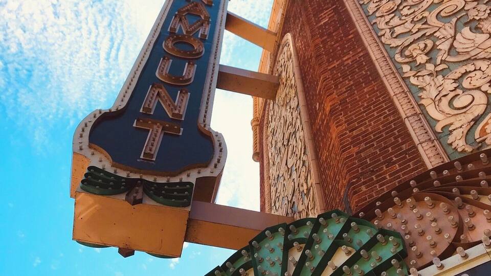 A theater marquee with "MGM" and "AS TIME GOES BY STACY 2019" text.