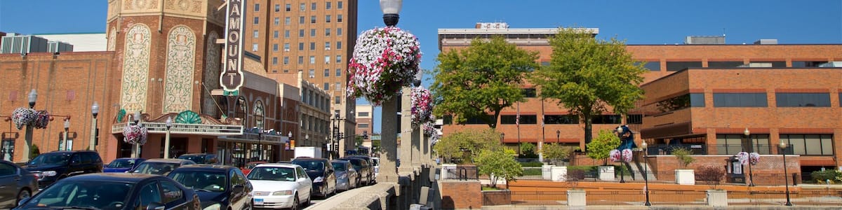 Aurora showing a bridge, a city and a river or creek