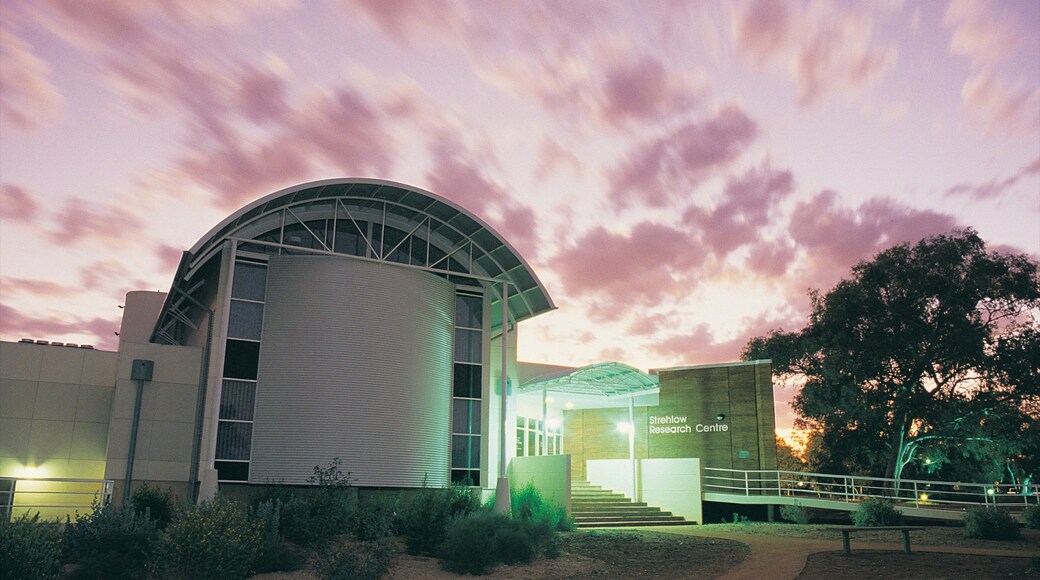 Araluen Cultural Precinct featuring modern architecture, aircraft and a sunset