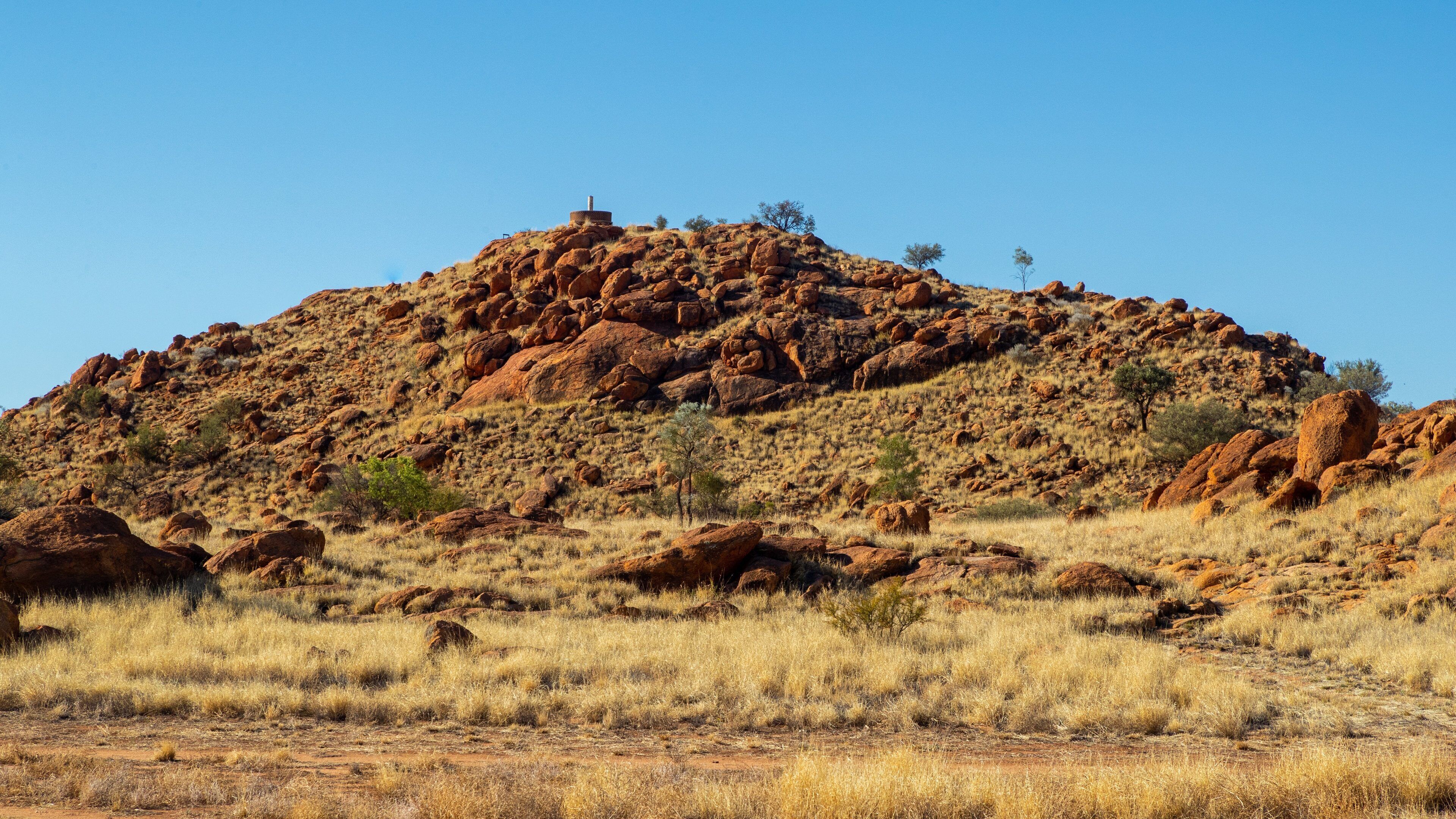 Alice Springs Telegraph Station featuring desert views and a gorge or canyon