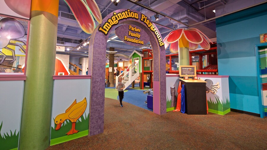 Omaha Children\'s Museum which includes interior views and signage as well as an individual child