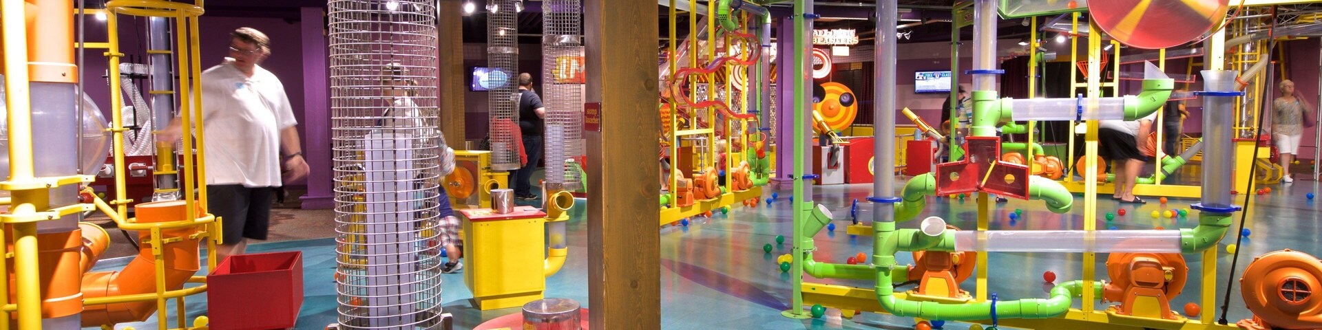 Omaha Children\'s Museum which includes interior views and a playground