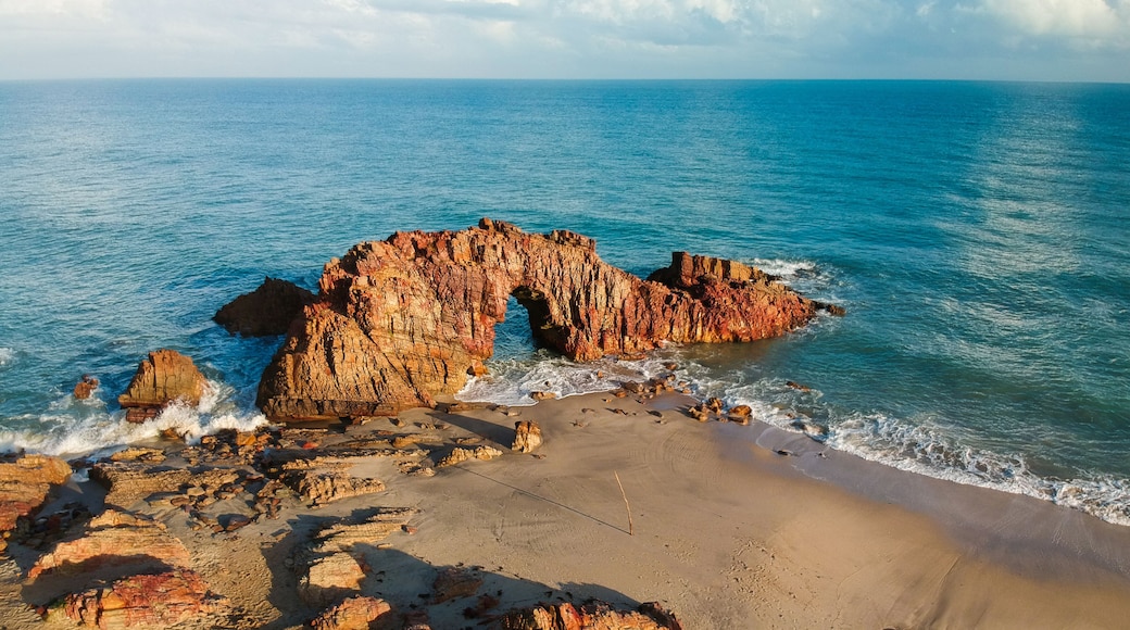 Pedra Furada. Famous touristic attraction on the beach of Jericoacoara, Ceara State, Brazil.