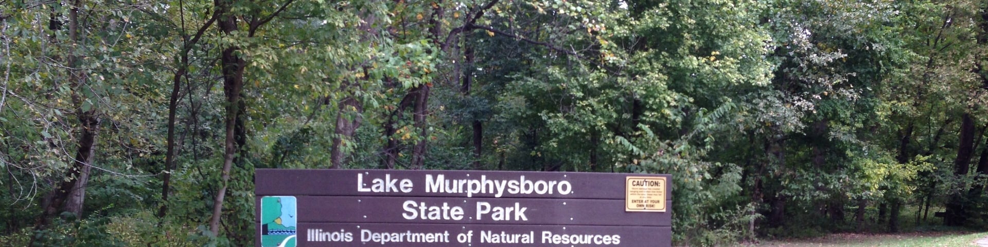 Lake Murphysboro State Park featuring signage and forest scenes