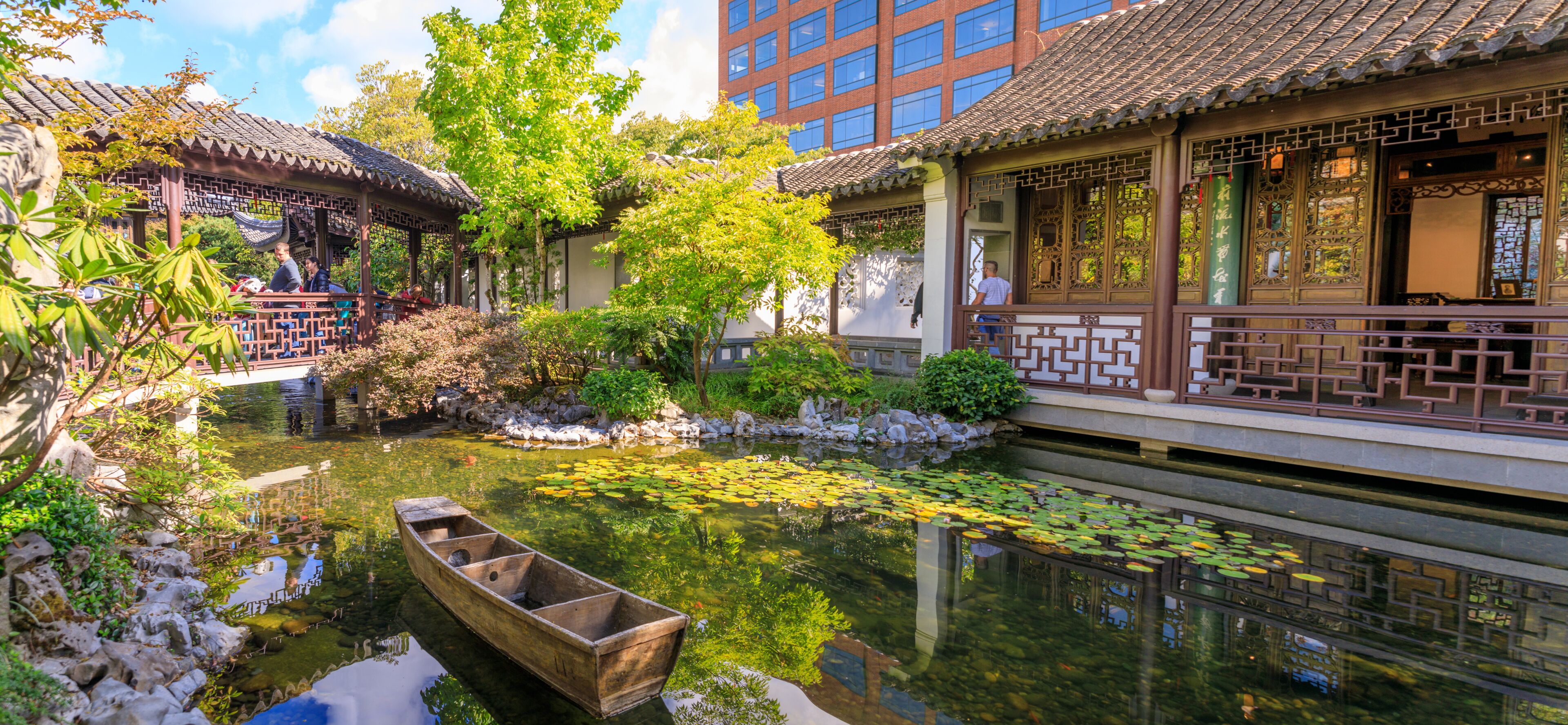 Lan Su Chinese Garden in summer season. Garden Pavilion reflects in pond