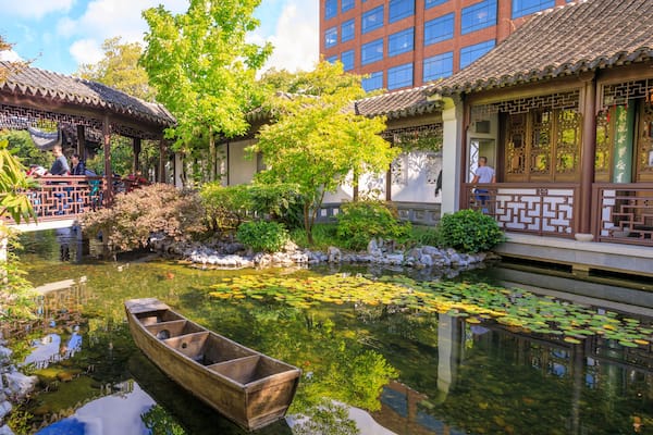 Lan Su Chinese Garden in summer season. Garden Pavilion reflects in pond