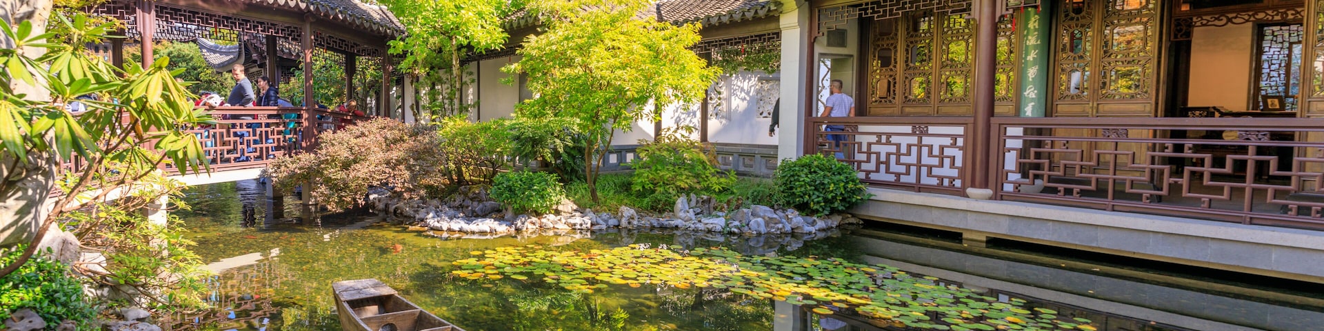 Lan Su Chinese Garden in summer season. Garden Pavilion reflects in pond