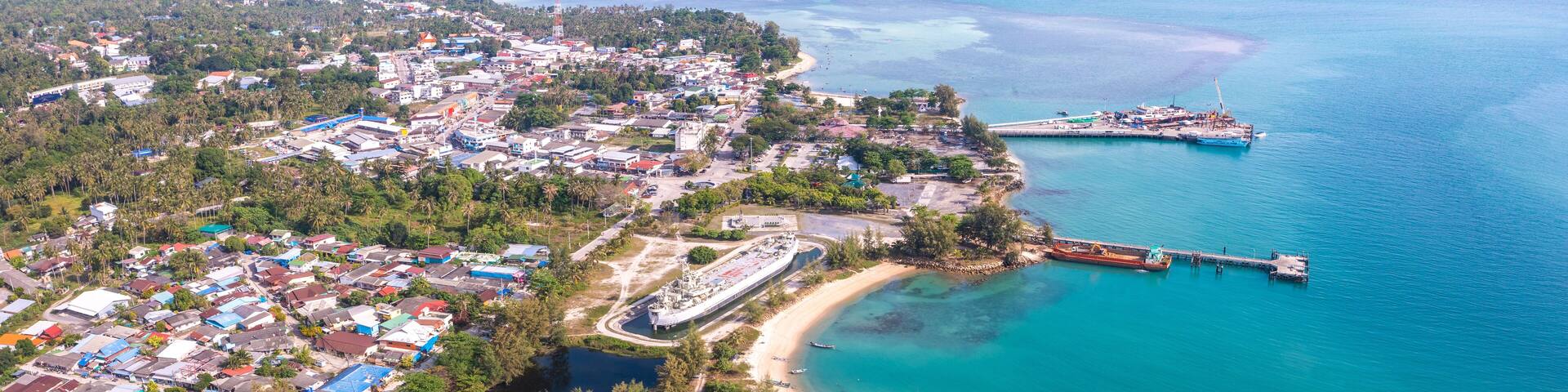 Aerial view of Thong Sala pier, boat and koh Tae Nai in koh Phangan, Thailand