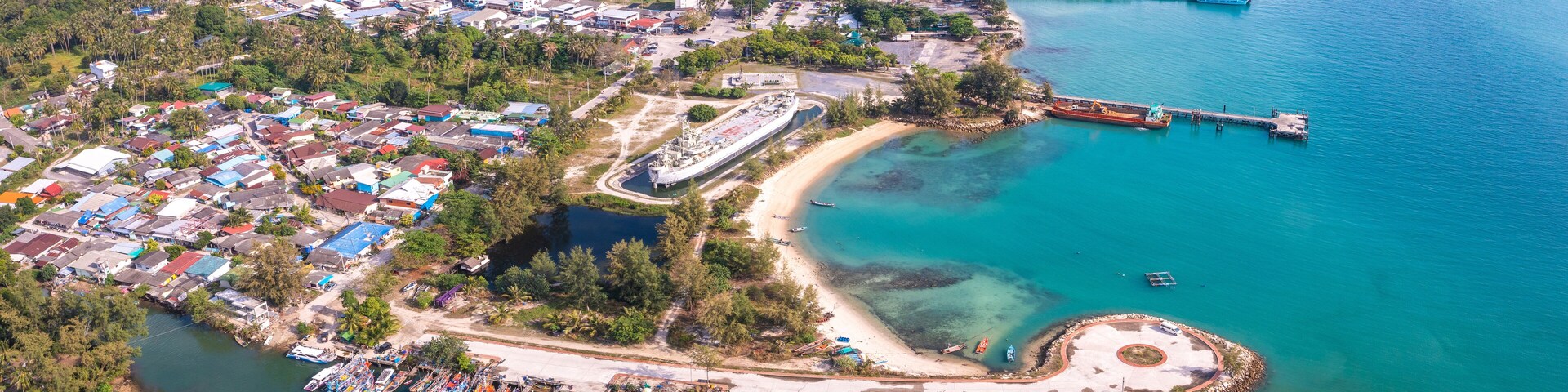 Aerial view of Thong Sala pier, boat and koh Tae Nai in koh Phangan, Thailand