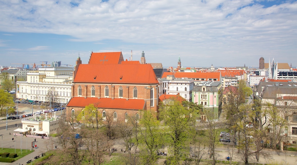 Corpus Christi Church showing a city and a church or cathedral
