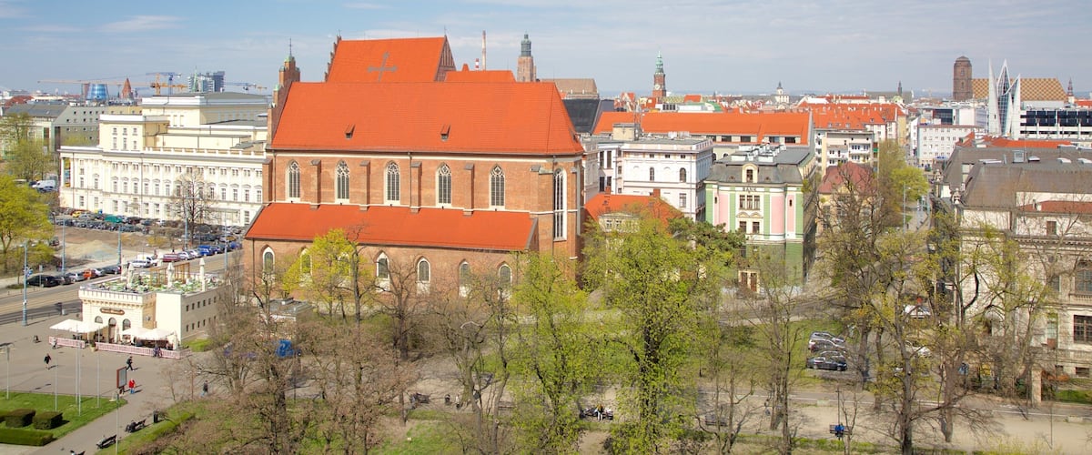 Igreja de Corpus Christi mostrando uma igreja ou catedral e uma cidade