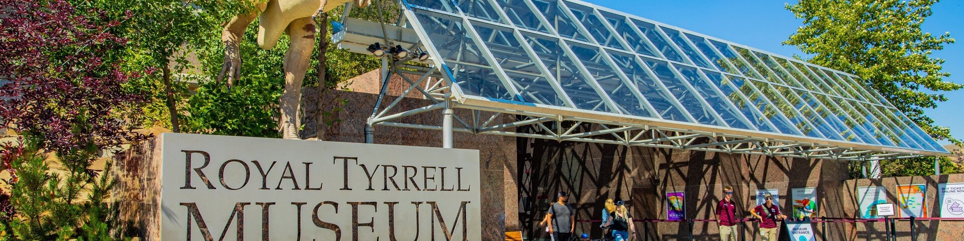 Royal Tyrrell Museum showing outdoor art and signage