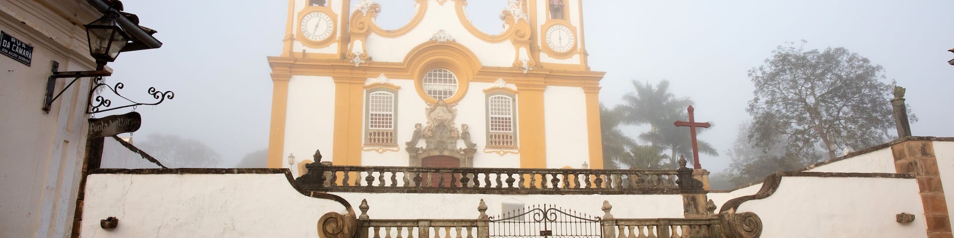 Fog with a view of the Santo Antonio Catholic Church in the city of Tiradentes in Minas Gerais