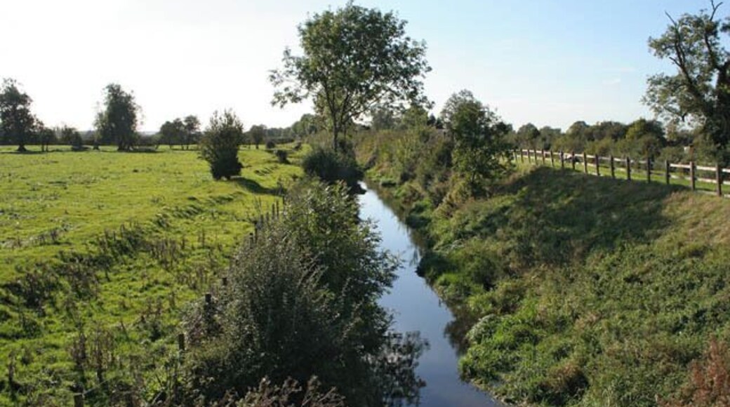 River Smite at Whatton-in-the-Vale Taken from the Whatton Bridge on the Old Grantham Road. There is a new bridge over the river and this one, which used to carry the main road from Nottingham to Grantham, now is just used by pedestrians.
