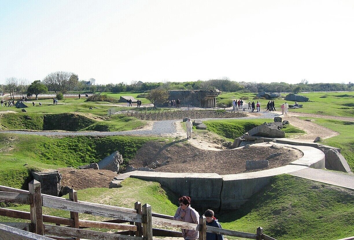An impressive D-Day site, this strategic bluff overlooking Utah Beach and Omaha Beach was heavily bombed in the weeks and days leading up to the invasion.  To get a true appreciation of the effect of this bombing, bring up the map in satellite view!

Although the Germans had initially positioned six large guns here, the aerial bombings forced them to hide the guns, rendering them useless on D-Day.  To be certain, though, US Army Rangers assaulted and scaled the cliffs to secure the site.
