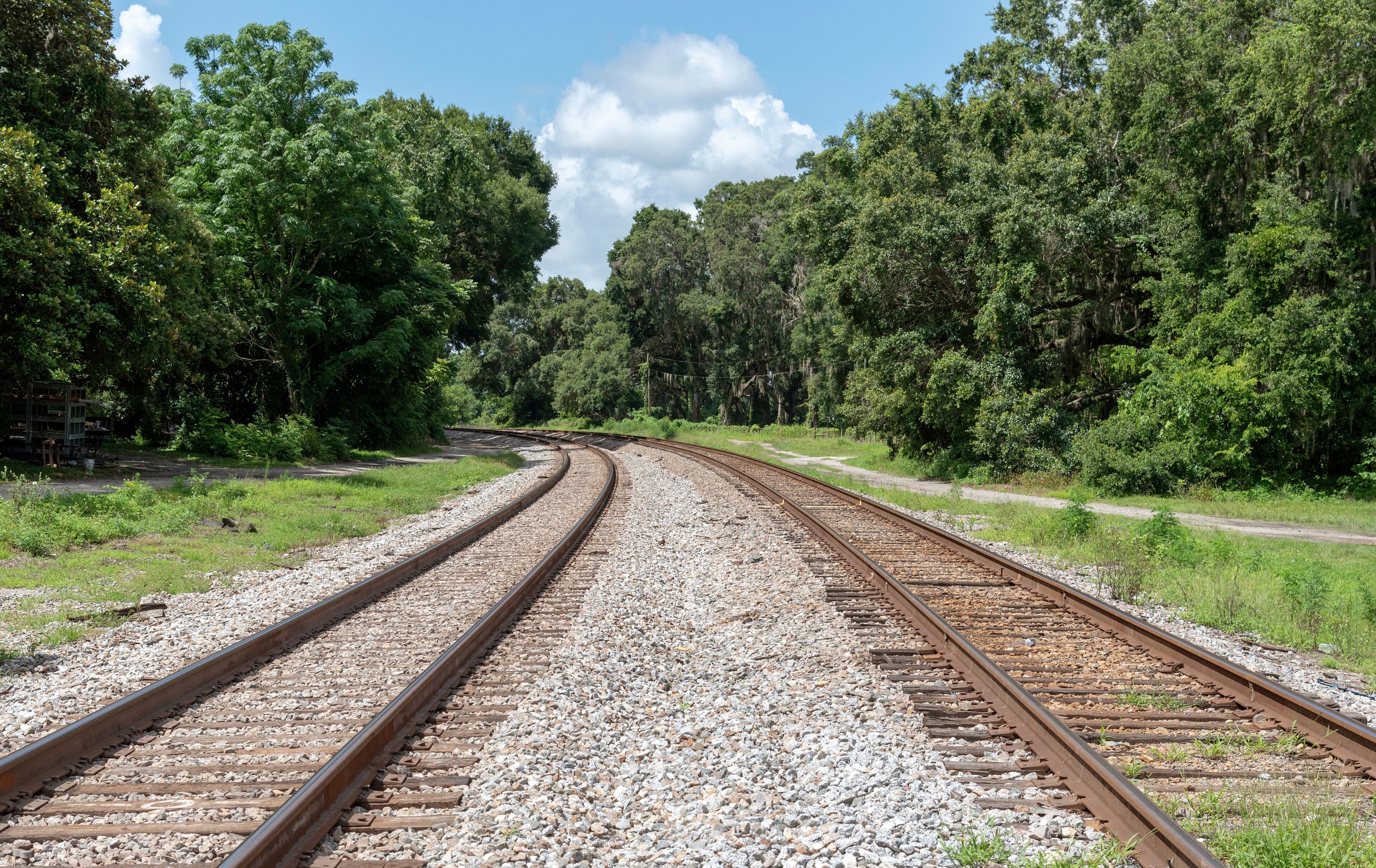 Summerfield, Florida, USA, 2018. Railroad signals and track passing through North Florida countryside.