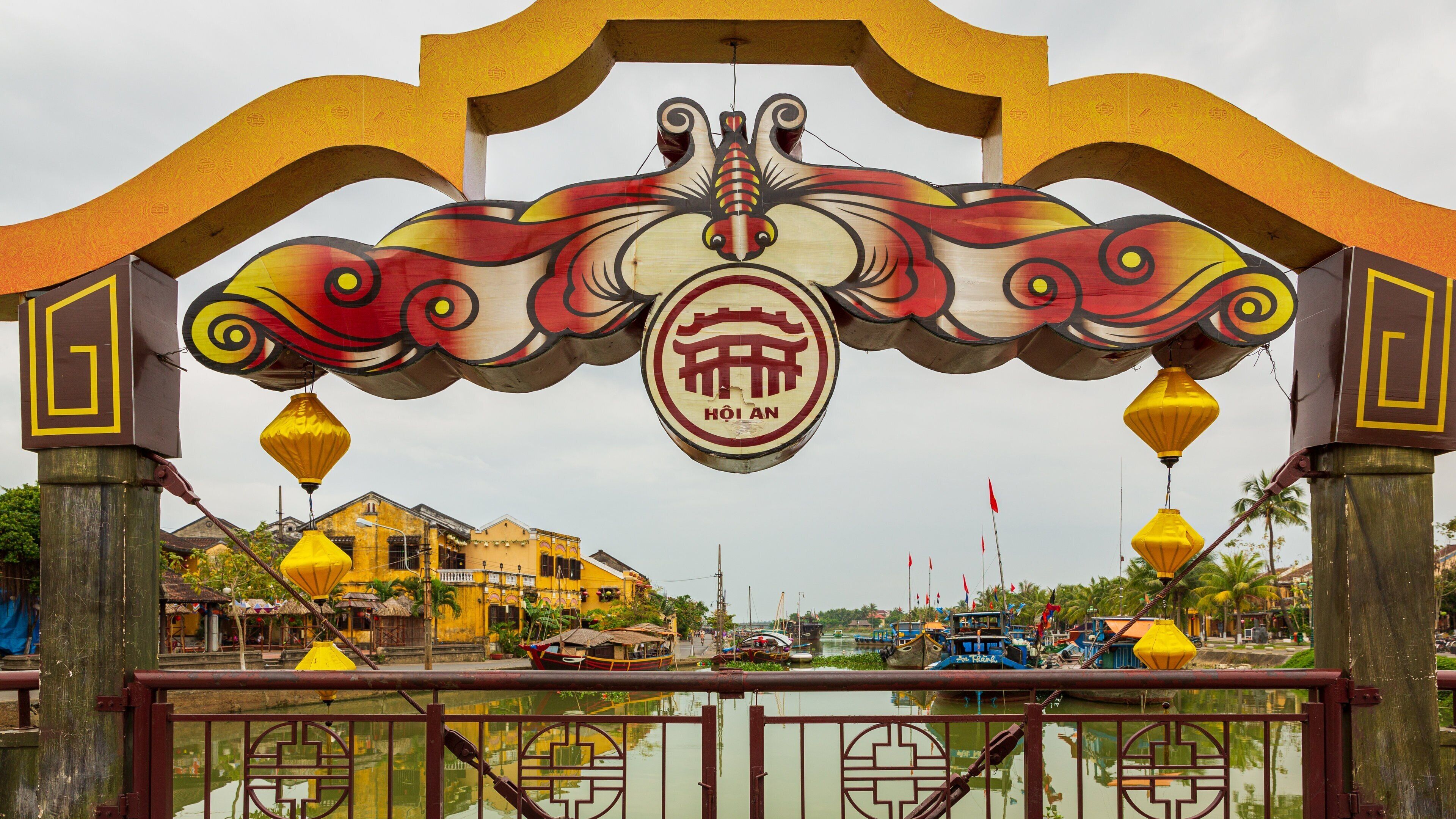 Hoi An Ancient Town featuring signage and a bay or harbor