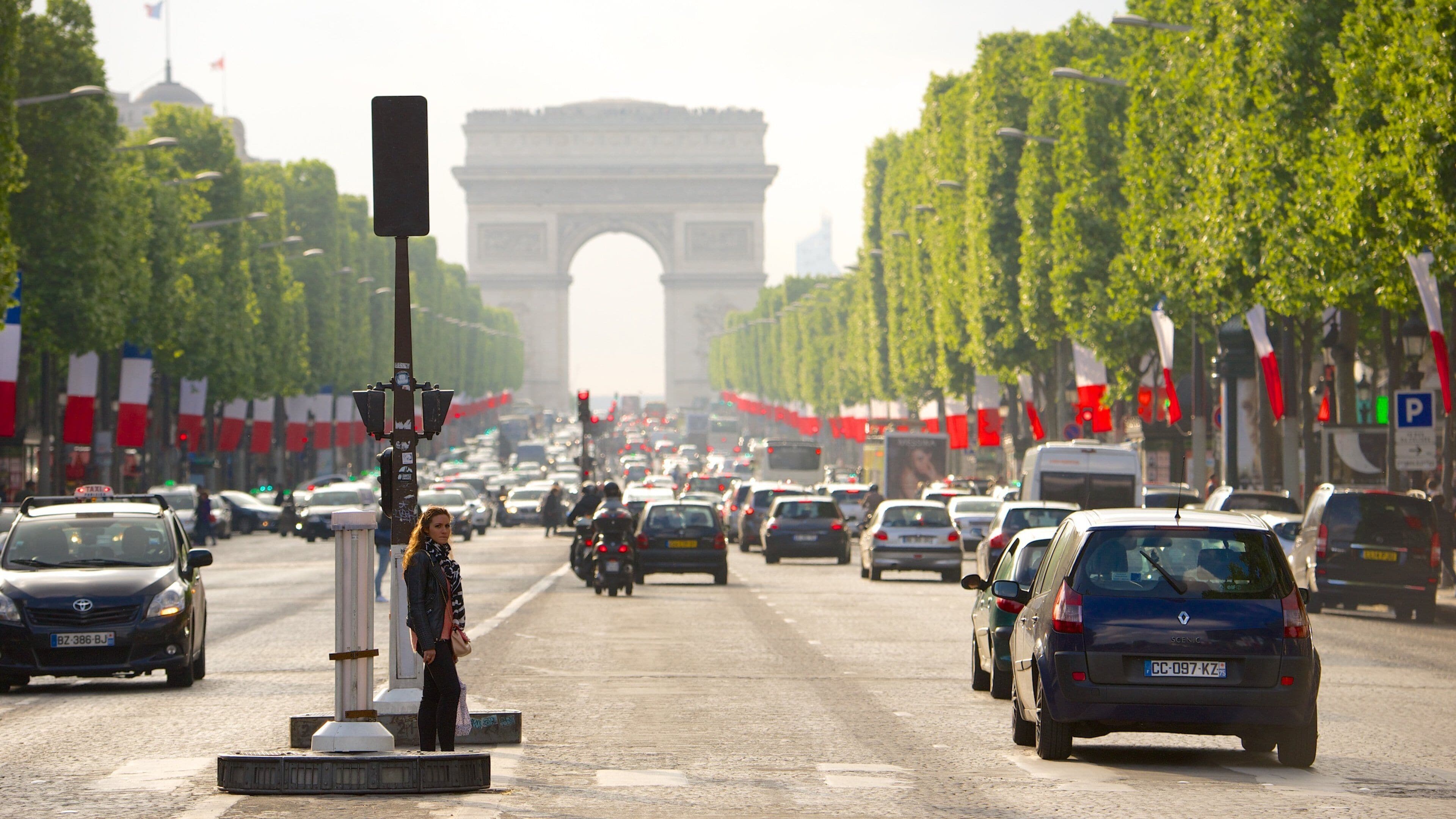 8th Arrondissement which includes street scenes and a monument as well as an individual femail