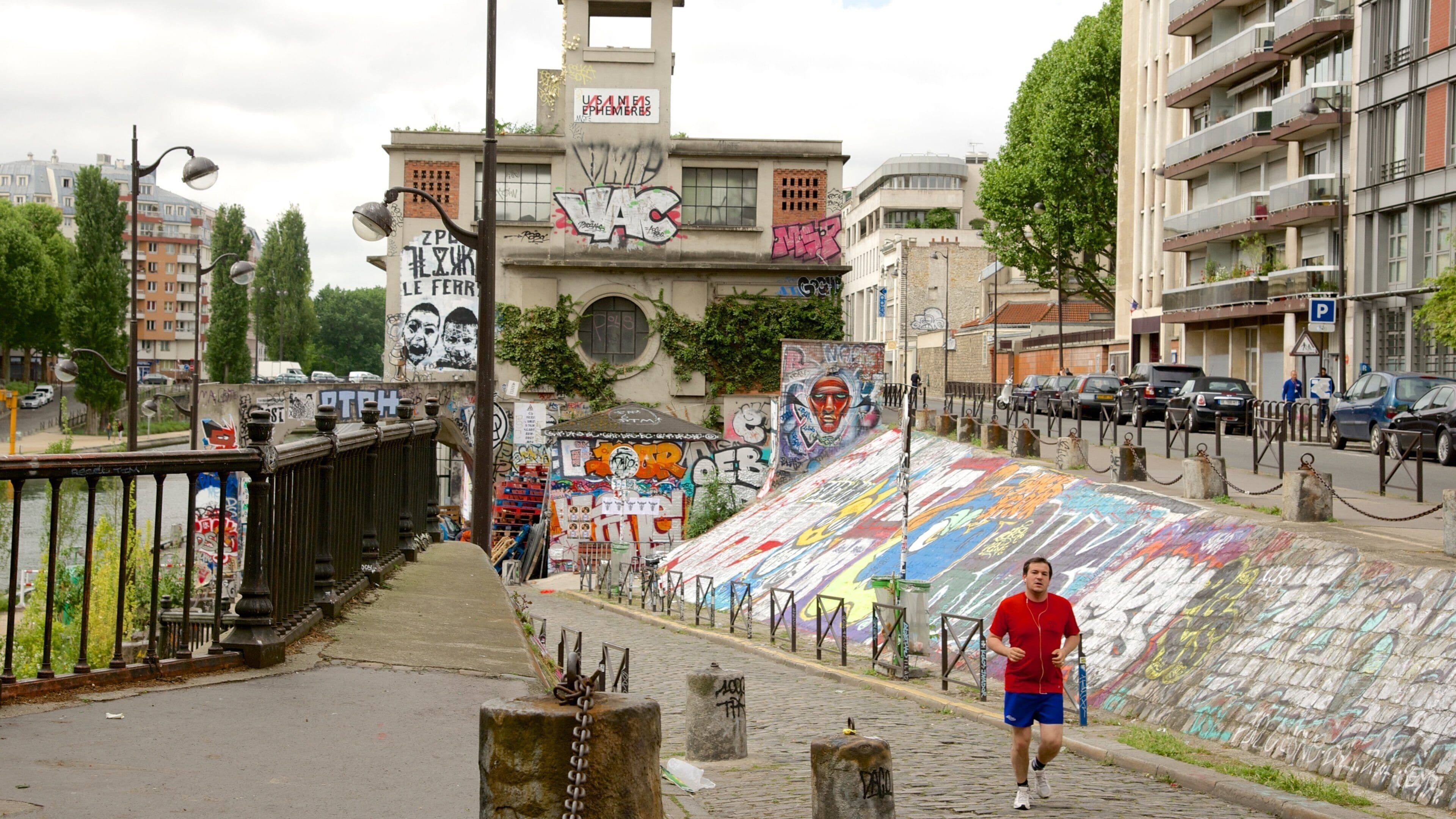 10th Arrondissement featuring outdoor art as well as an individual male