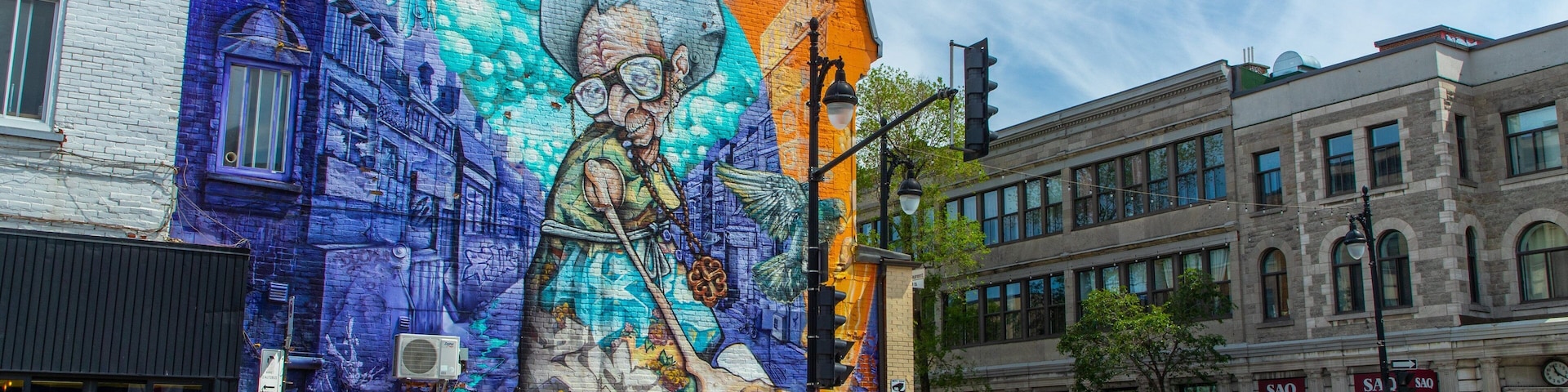 Saint Laurent Boulevard featuring street scenes and outdoor art