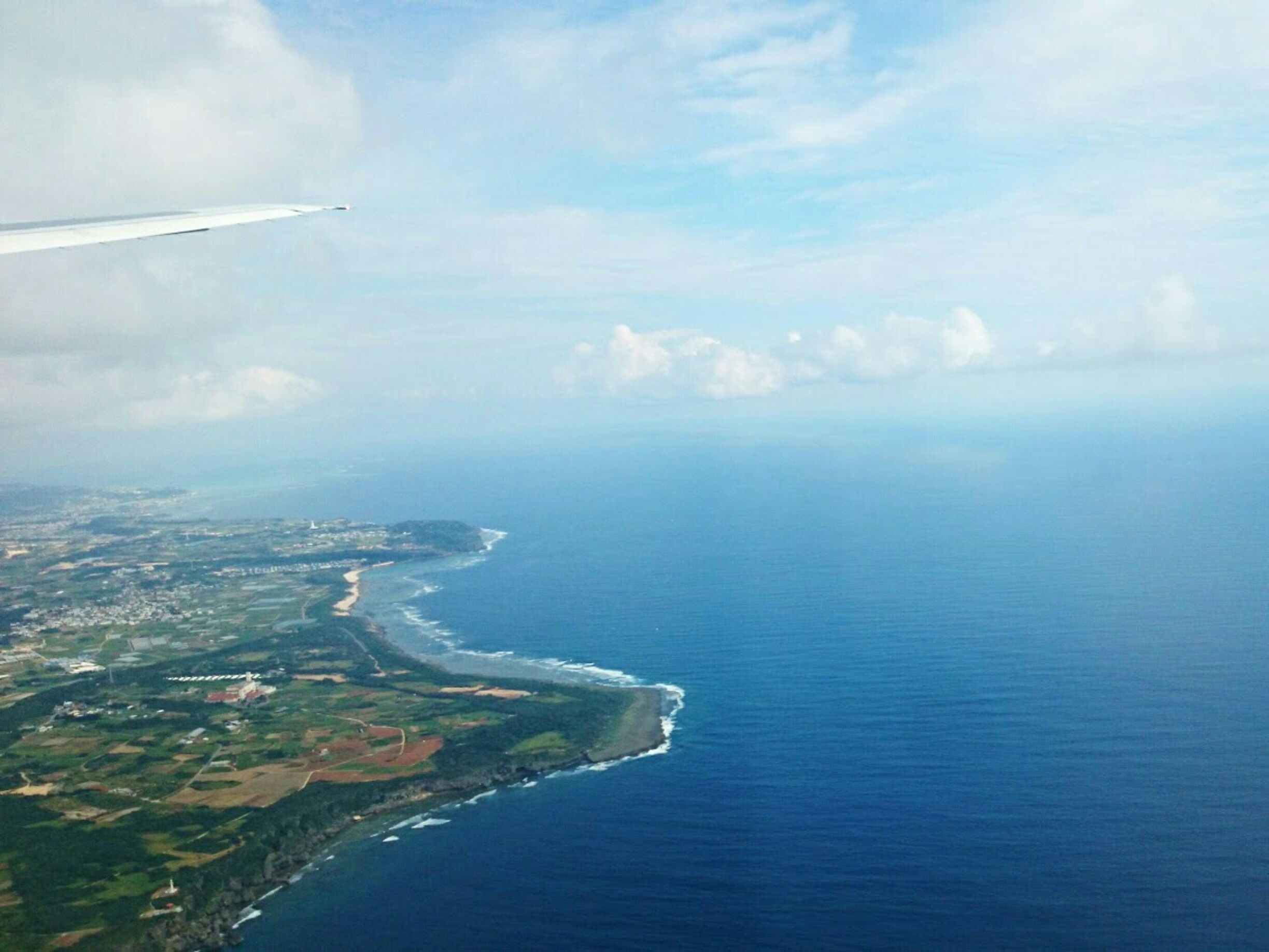 Flying into Naha Airport, you can see the edge of Itoman city below. This small island of Okinawa was previously and independent kingom called Ryukyu before it became one of Japan's prefectures. It boasts goegeous oceans, old ruins, and friendly (not to mention long living) locals.

*Flights from Tokyo to Naha are about 2.5 hours. This photo was taken on an ANA flight.