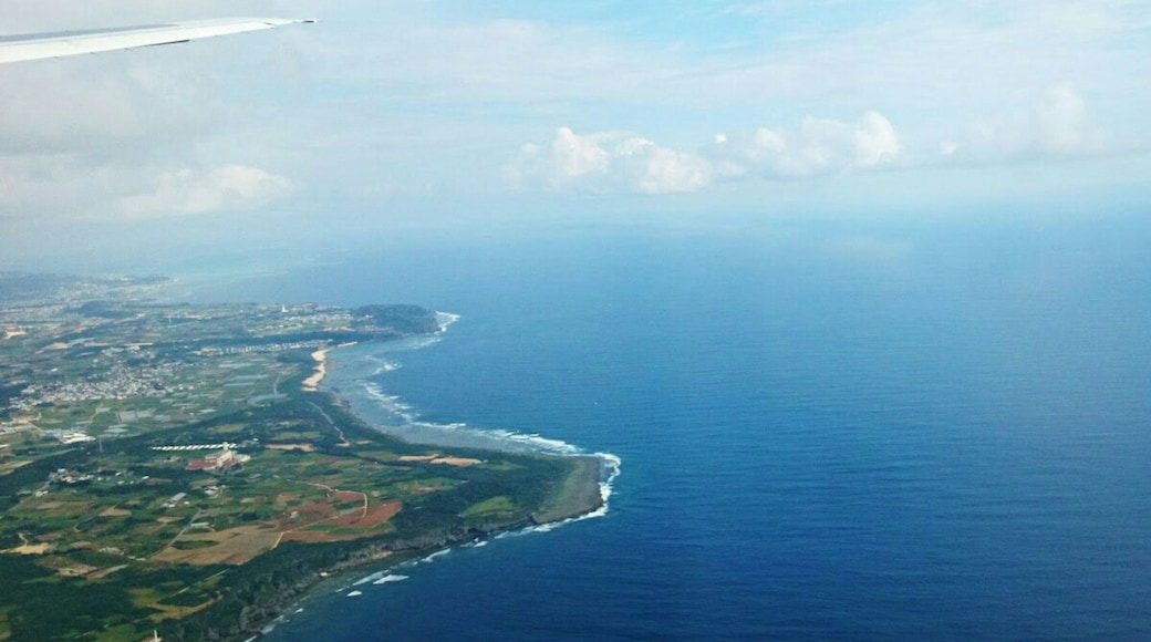 Flying into Naha Airport, you can see the edge of Itoman city below. This small island of Okinawa was previously and independent kingom called Ryukyu before it became one of Japan's prefectures. It boasts goegeous oceans, old ruins, and friendly (not to mention long living) locals.
*Flights from Tokyo to Naha are about 2.5 hours. This photo was taken on an ANA flight.
