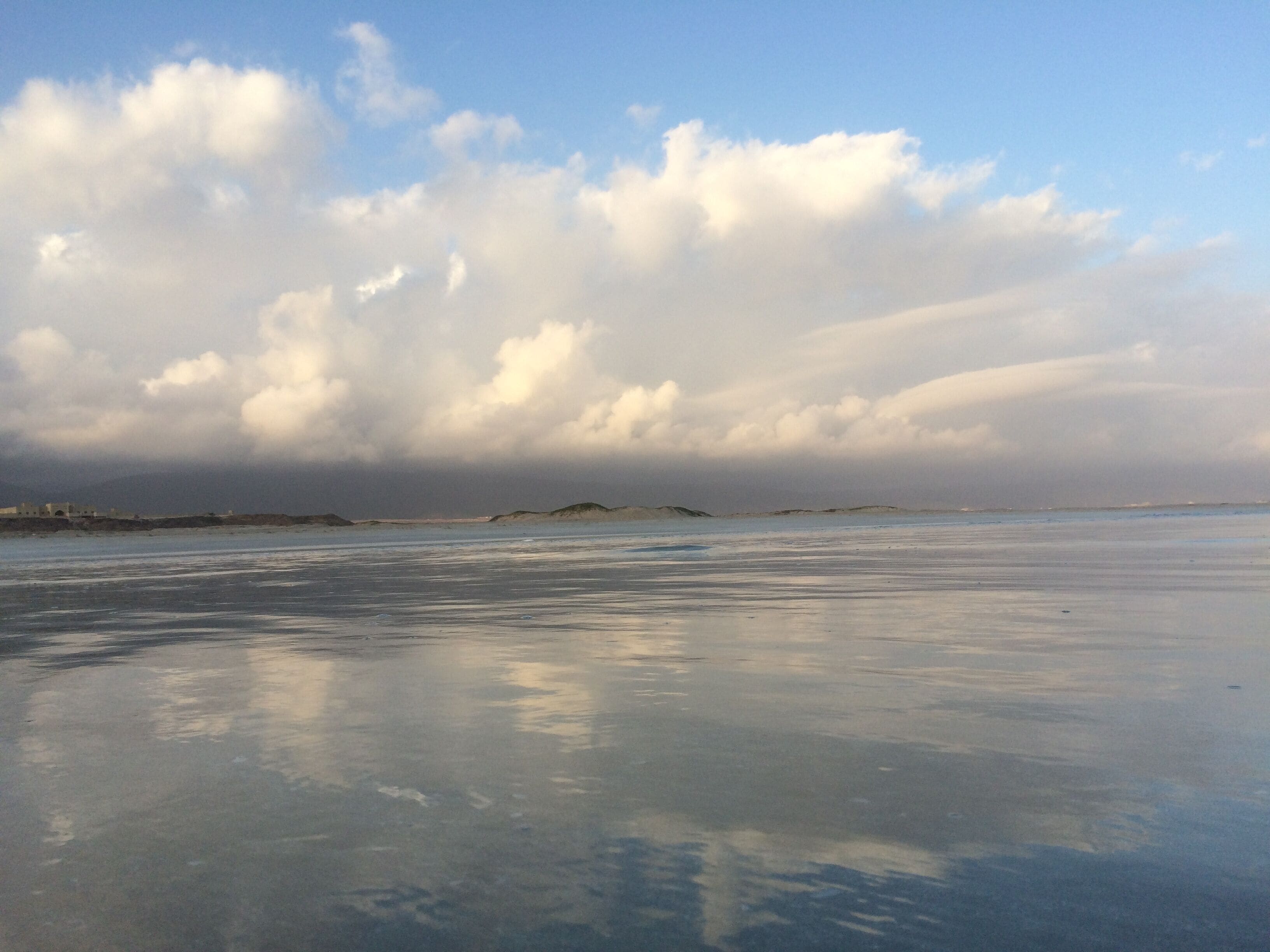 Cloud reflection on the shore