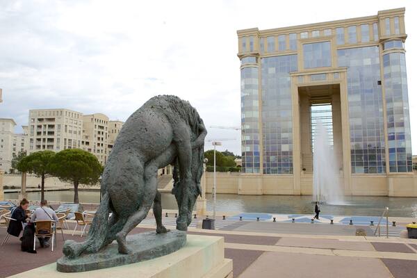 Esplanade de l\'Europe featuring a statue or sculpture and street scenes