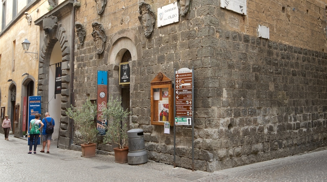Moro Tower featuring a small town or village and signage