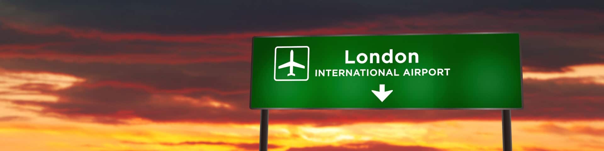 Plane landing in London England, UK airport with signboard