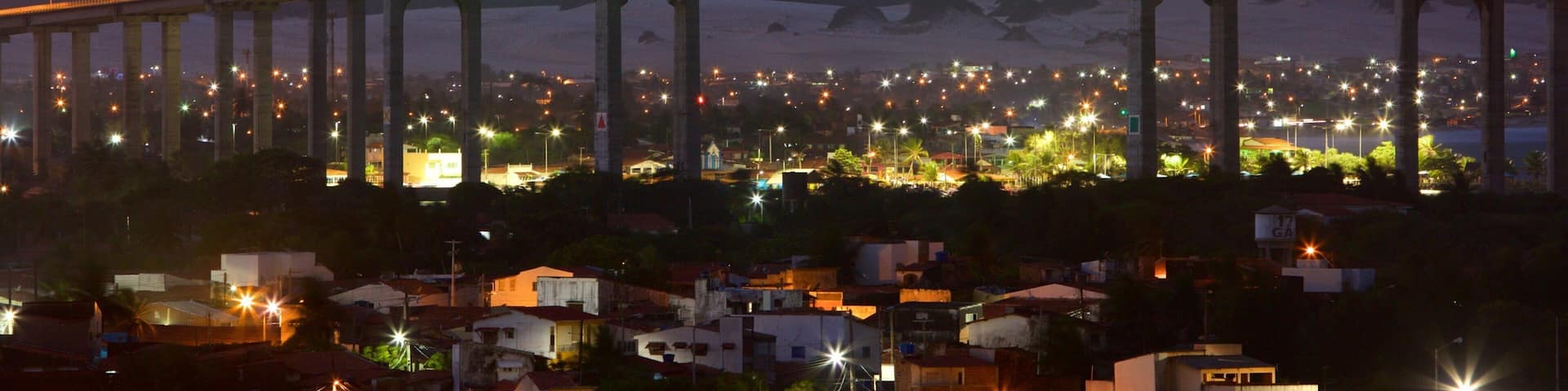 Newton Navarro Bridge featuring a bridge and night scenes