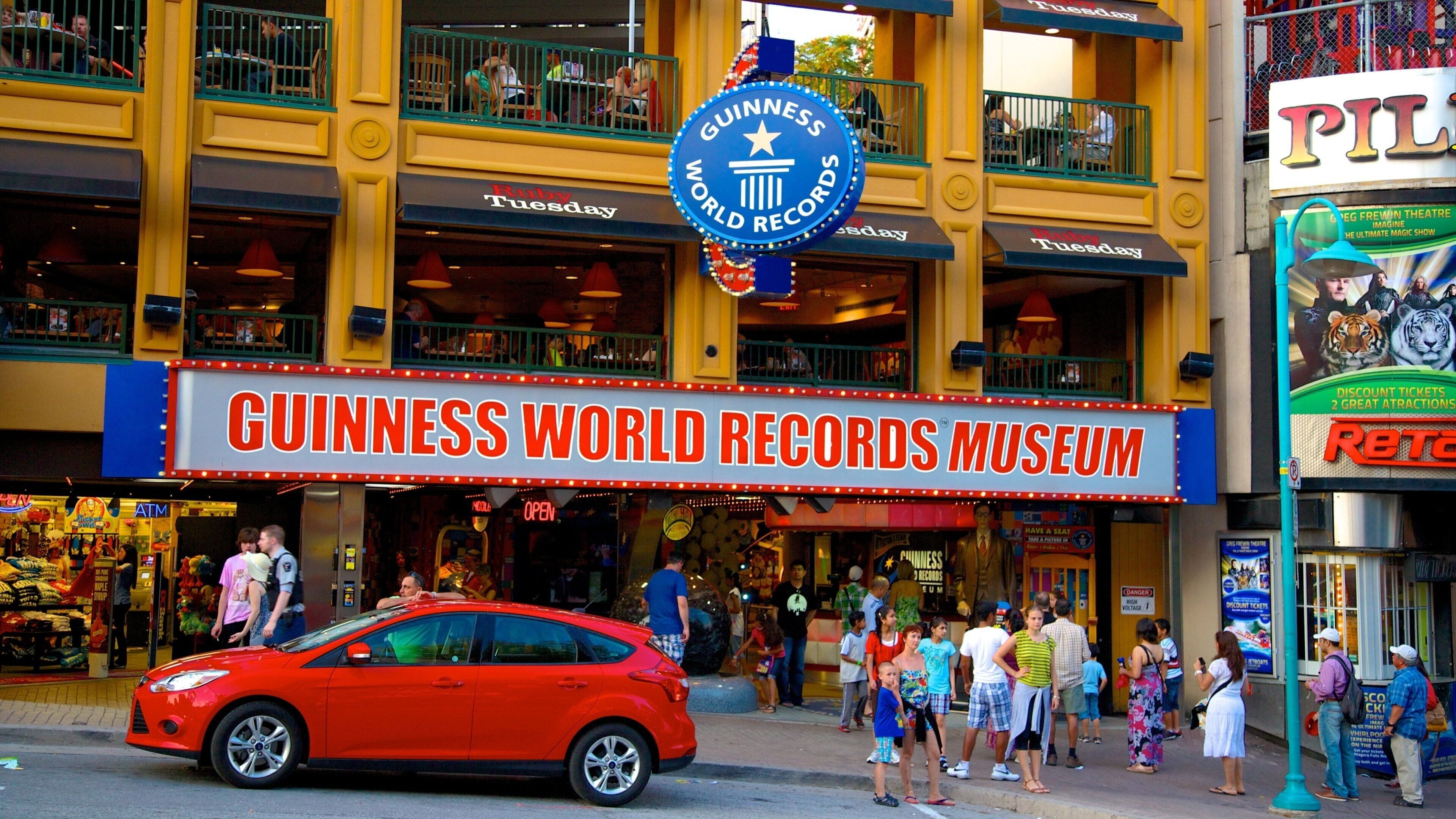 Niagara SkyWheel which includes a city, street scenes and signage