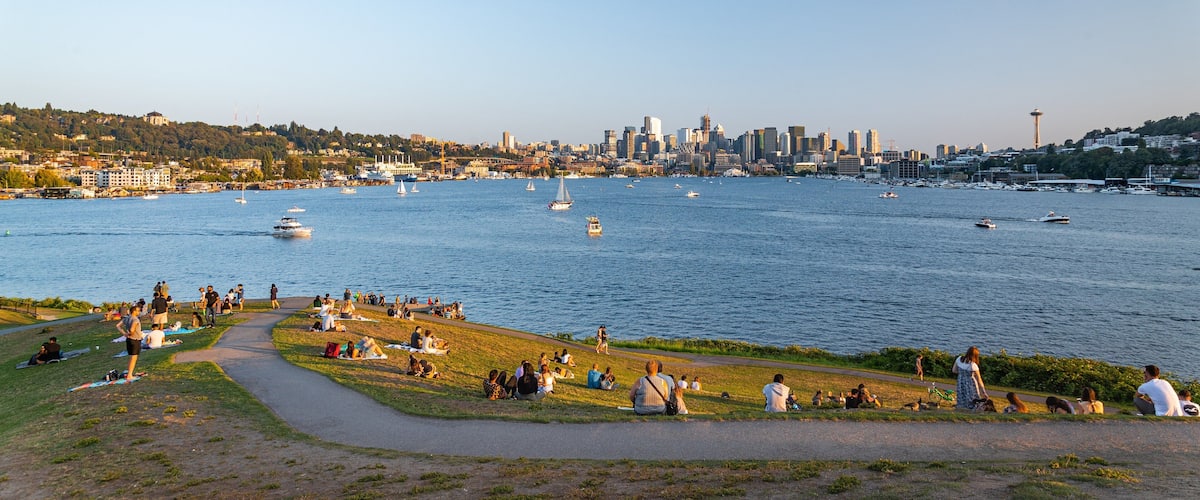 Gas Works Park featuring a garden, a sunset and a bay or harbor