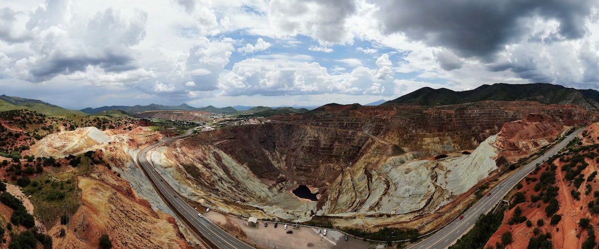 Aerial Panorama of the Queen Copper Mine in the town of Bisbee, Arizona. Image captured during the summer Monsoon season.