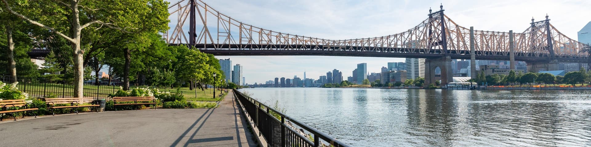 Queensbridge Park showing a river or creek and a bridge