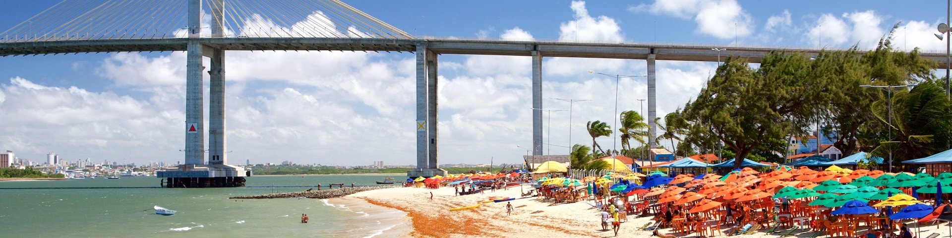 Redinha Beach featuring a sandy beach, general coastal views and a bridge