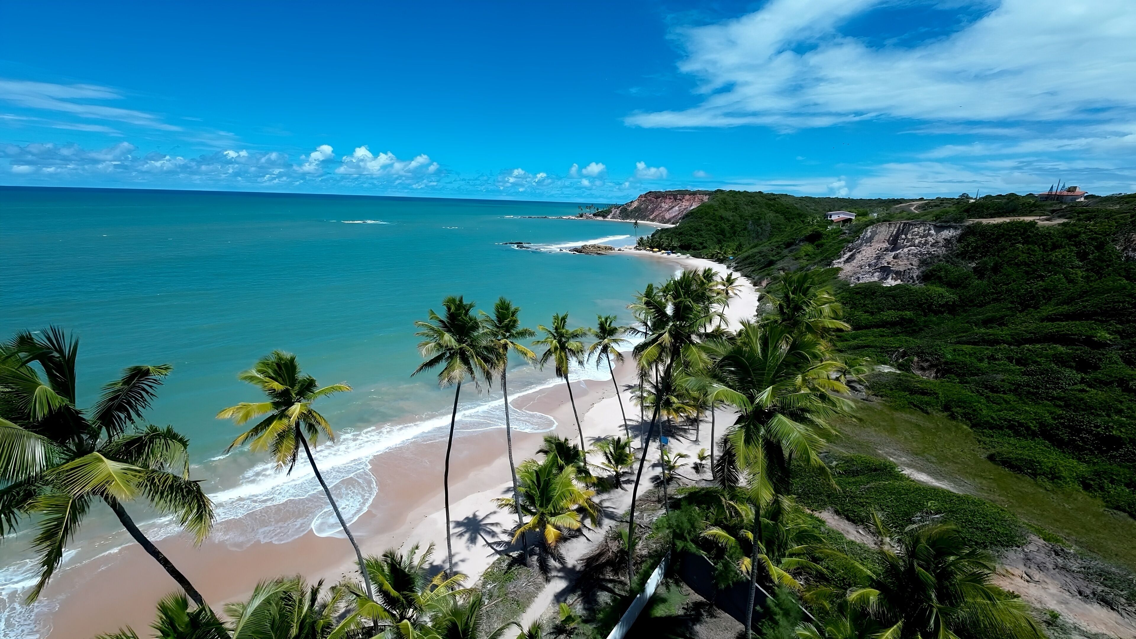 Tambaba Beach In Conde Paraiba Brazil. Turquoise Ocean Waves Gently Crashing On Tropical Beach. Shore Clouds Sky Beach Sea. Seaside Panorama. Conde Paraiba.