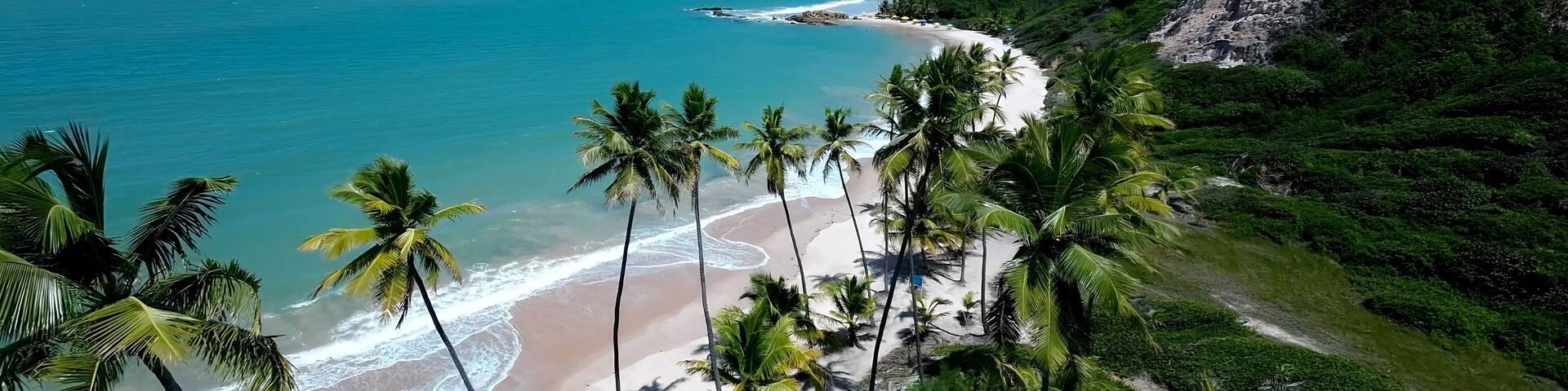 Tambaba Beach In Conde Paraiba Brazil. Turquoise Ocean Waves Gently Crashing On Tropical Beach. Shore Clouds Sky Beach Sea. Seaside Panorama. Conde Paraiba.