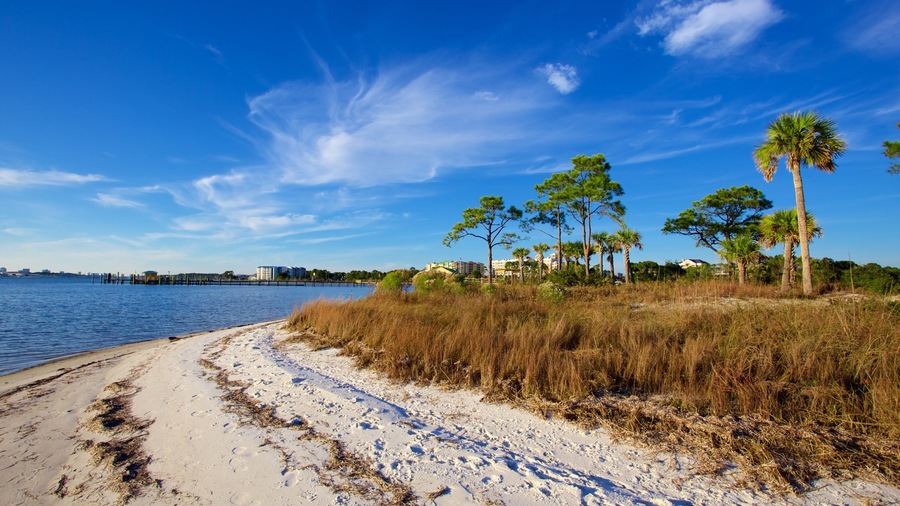 Upper Grand Lagoon featuring a lake or waterhole, a sandy beach and tranquil scenes