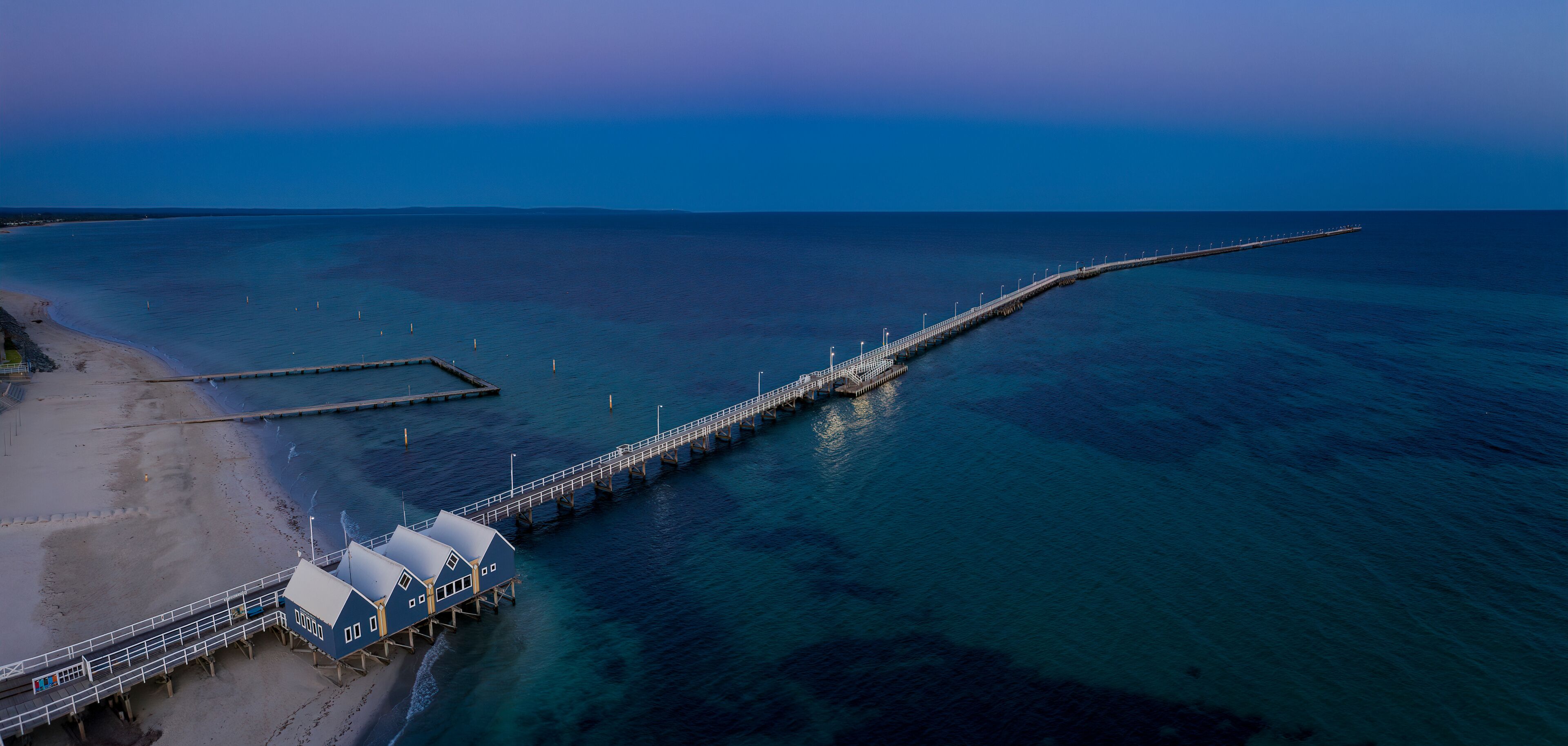 Panoramic aerial dawn view of the iconic Busselton Jetty, located 220 km south west of Perth, Western Australia