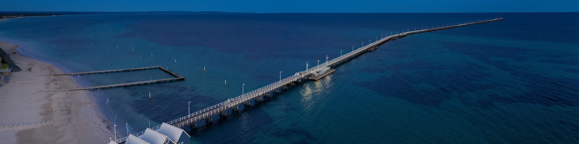 Panoramic aerial dawn view of the iconic Busselton Jetty, located 220 km south west of Perth, Western Australia